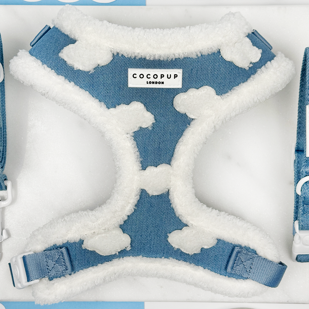 Blue and white dog harness with fluffy white clouds, featuring the Cocopup London branding.