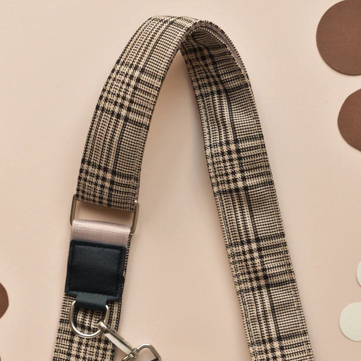Beige and black plaid strap with metal clasp, designed for Cocopup London dog walking bag or treat pouch.